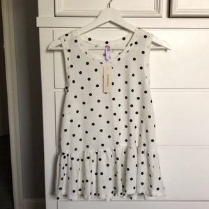 White & black polka dot peplum top